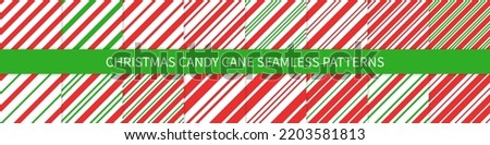 Christmas candy cane striped seamless pattern set. Christmas candycane background with red and green stripes. Peppermint caramel diagonal print. Xmas traditional wrapping texture. Vector illustration. Royalty-Free Stock Photo #2203581813