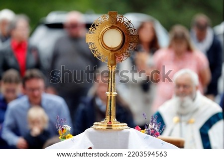 Corpus Christi or Feast of the Blessed Sacrament.  Eucharistic adoration.  La Roche sur Foron. France.  Royalty-Free Stock Photo #2203594563