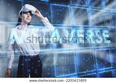 businesswoman with VR glasses looking at creative glowing metaverse hologram on blurry office interior background. Future, digital world and cyberspace concept. Double exposure.