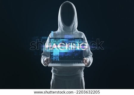 Hacker holding laptop with abstract glowing big data glitch on black background. Hacking and theft concept. Unique Design Abstract Digital Pixel Noise Glitch Error Video Damage