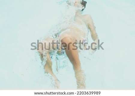 Abstract photo lifestyle collection. Unrecognizable, child body leg knee hand in water. Mystery mood. Concept of weightlessness, uncertain future life, drowning in obscurity, childhood issues