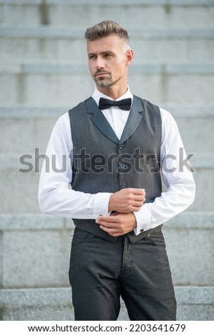 rich man in bowtie. grizzled man in formalwear. tux man bridegroom Royalty-Free Stock Photo #2203641679