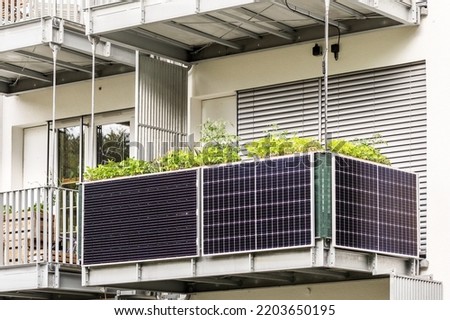 Solar panels on Balcony of  Apartment Building. Modern Balcony Apartment Solar power panel. Royalty-Free Stock Photo #2203650195