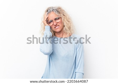 Middle age caucasian woman isolated on white background tired and very sleepy keeping hand on head.