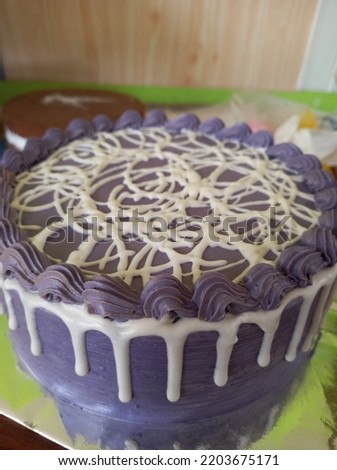 stock photo of purple birthday cake decoration close-up 