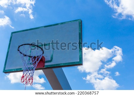 Basketball hoop on blue sky and cloud