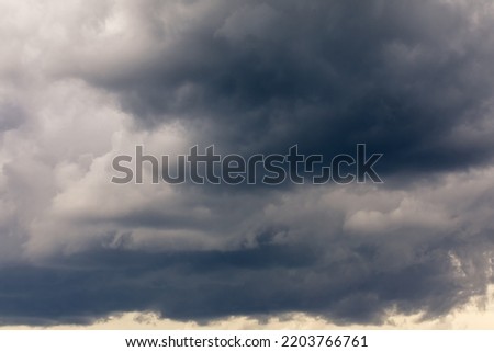 Background from a dark stormy sky. thunderstorm, Gloomy atmosphere of the apocalypse