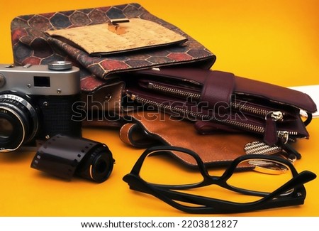 Old film camera with accessories and glasses with diopters