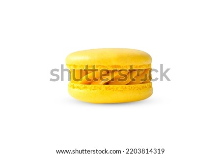 yellow macaron with curdled cream isolated on white