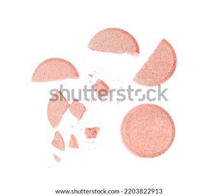 Broken effervescent tablets isolated. Fizzy tablets group closeup, crumbled pink orange effervescent vitamine supplement on white background Royalty-Free Stock Photo #2203822913