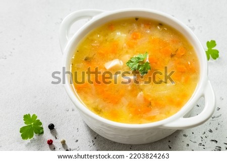 Healthy split pea soup with ham in bowl. Top view, copy space, flat lay. Royalty-Free Stock Photo #2203824263