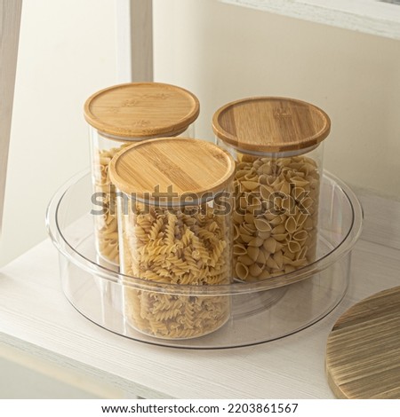 Bamboo Storage Jars in lazy susan  Royalty-Free Stock Photo #2203861567