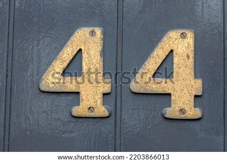 Close Up Of A House Number 44 