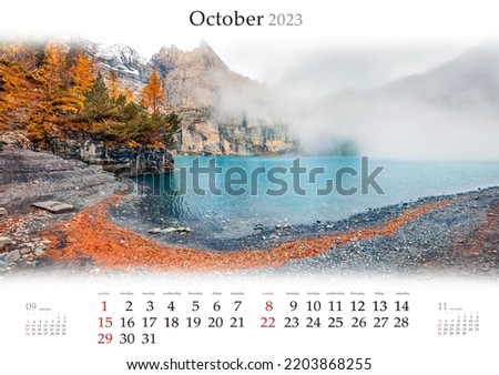 Wall calendar for 2023 year. October, B3 size. Set of calendars with amazing landscapes. Thick fog spreds on Oeschinensee Lake, Switzerland. Monthly calendar ready for print.