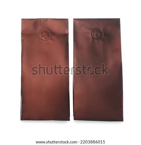 Two blank foil packages isolated on white