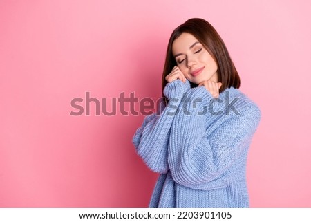 Portrait of young dreamy cute girl wear knitted pullover dreaming boyfriend buy new shoes isolated on bright pink color background Royalty-Free Stock Photo #2203901405