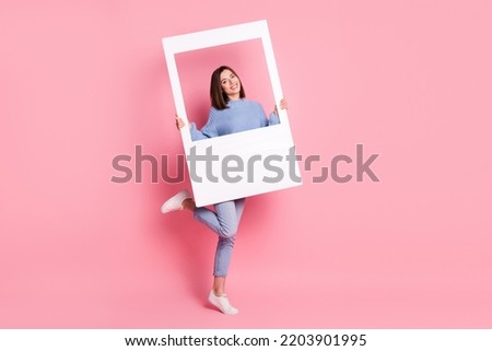 Full size of young funny attractive popular lady blogger holding paper window showing happiness isolated on pink color background