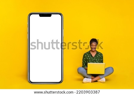 Photo of cheerful funny trans human wear smart casual outfit chatting modern gadget empty space isolated yellow color background