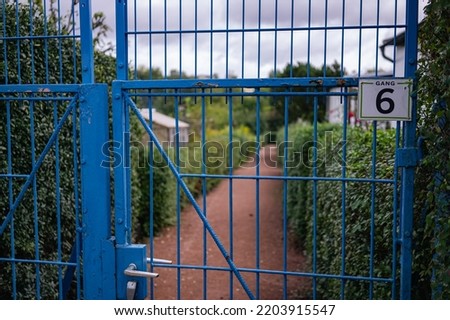 closed blue gate to a private area
