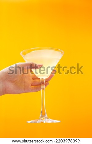 This is yellow background of alcohol glass drink design for summer celebration, as well useful in restaurant and party.