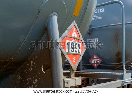 Selective Focus of Flammable Hazardous Materials Sign (class 3) on Railroad Tank Car in New Orleans, Louisiana, USA