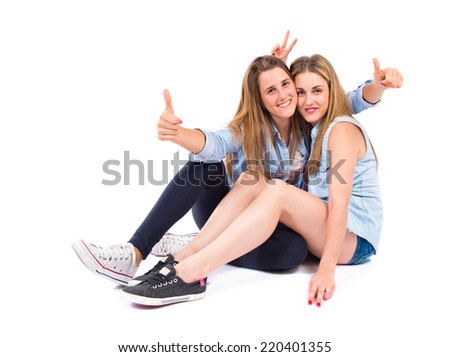 Friends with thumb up over white background