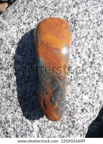 Rivers stones and different colors jade jasper rohdonite iron oxide moon stone nephrite