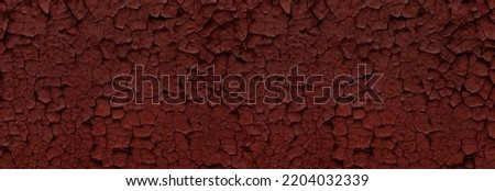 paint flakes on cracked wall background Royalty-Free Stock Photo #2204032339