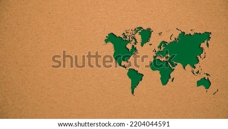 Green papercut world map on recycled paper. Recycled paper cutout for save planet earth concept. World Map Green Planet Earth Day or Environment day Concept.