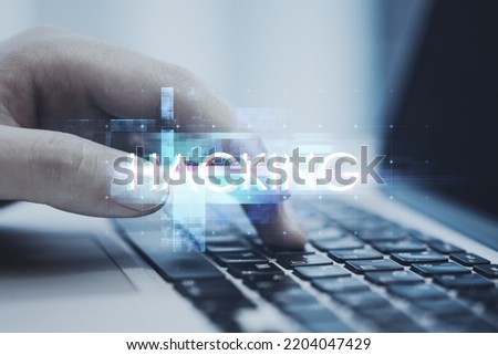 Close up of businessman hand using laptop keyboard with creative glowing big data glitch on blurry background. Unique design abstract digital pixel noise glitch error video damage. Double exposure