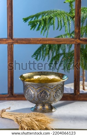 Iranian decorative metal handicraft cup traditional background