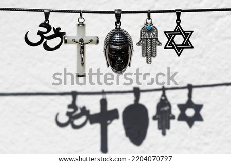Religious symbols.  Christianity, Islam, Judaism, Buddhism and Hinduism. Interfaith dialogue.   Royalty-Free Stock Photo #2204070797