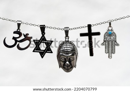 Religious symbols.  Christianity, Islam, Judaism, Buddhism and Hinduism. Interfaith dialogue.   Royalty-Free Stock Photo #2204070799