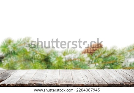 Christmas table background with winter bokeh backdrop. For display your product