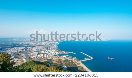 Panorama of Antalya (Turkey) overlooking the coast, view from Mount Tunektepe (Tunektepe Teleferik) on a summer day, under blue sky