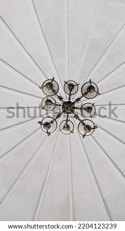 Chandelier with eight pillars on a white background