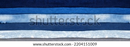 Banner of different types Denim jeans closeup set background, Top view and copy space. Textured cloth pants collage pattern. Mock up fashion. Selective focus