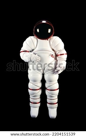 Space suits isolated on black background with clipping path. Elements of this image furnished by NASA.