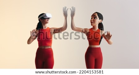 Woman experiencing a 3D simulation in the metaverse. Young woman playing virtual reality games as a 3D avatar. Young woman interacting with immersive technology using a virtual reality headset.