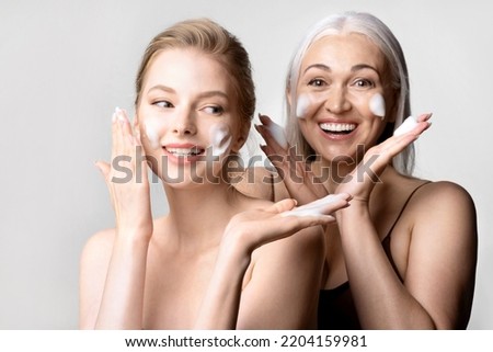 Women of different ages take care of their skin  washing faces by cleansing cosmetics product. Skincare routine