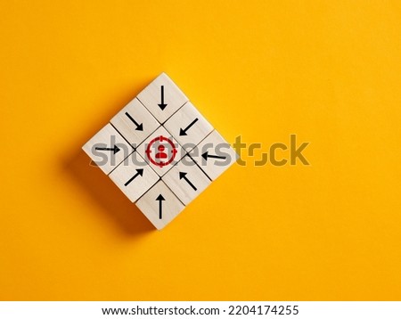 Arrows on wooden cubes pointing towards the focused target customer. Target customer, buyer persona, marketing segmentation or job recruitment concepts. Royalty-Free Stock Photo #2204174255
