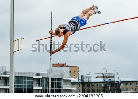 athlete jumper failed attempt pole vault Royalty-Free Stock Photo #2204183205