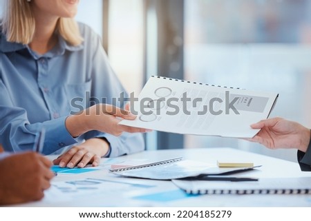 Hand, document and meeting with marketing team at a table reading report, proposal or paperwork. Teamwork, collaboration and support in a finance workshop with business people at a startup company Royalty-Free Stock Photo #2204185279
