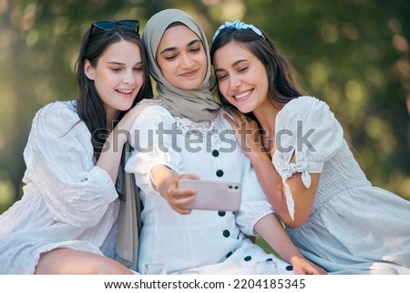 Diversity group of women, friends and selfie in park, garden and outdoor picnic together. Happy, smile and multicultural woman community taking phone photos for social media, fun and summer lifestyle