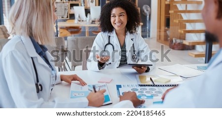 Medical doctors talk about research, consulting each others scientific opinion and giving expert analysis of patients health. Clinics can help people by providing quality services that are affordable Royalty-Free Stock Photo #2204185465