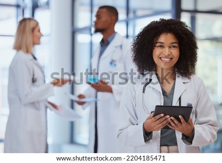 Black woman healthcare doctor with tablet for research in .medical hospital leadership, help and trust. African girl pharmacist with internet digital technology data for medicine analytics results Royalty-Free Stock Photo #2204185471