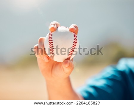 Fitness, sports and baseball training by a child practice his pitcher skills at an outdoor baseball field. Exercise, motivation and power with young boy closeup hand holding a ball, ready to pitch