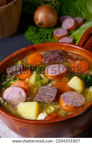 Delicious savoy cabbage stew in a rustic bowl