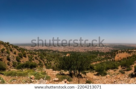 Beautiful panoramic photo of the moroccan city of Beni Mellal seen from the height of the middle atlas and the tadla plain. Concept panoramic, photography, morocco, beni melal.