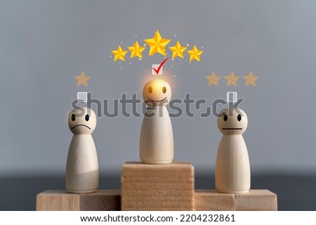 Concept image of setting a five star goal. increase rating or ranking, evaluation and classification idea. The wooden blocks on the podium represent a great win.